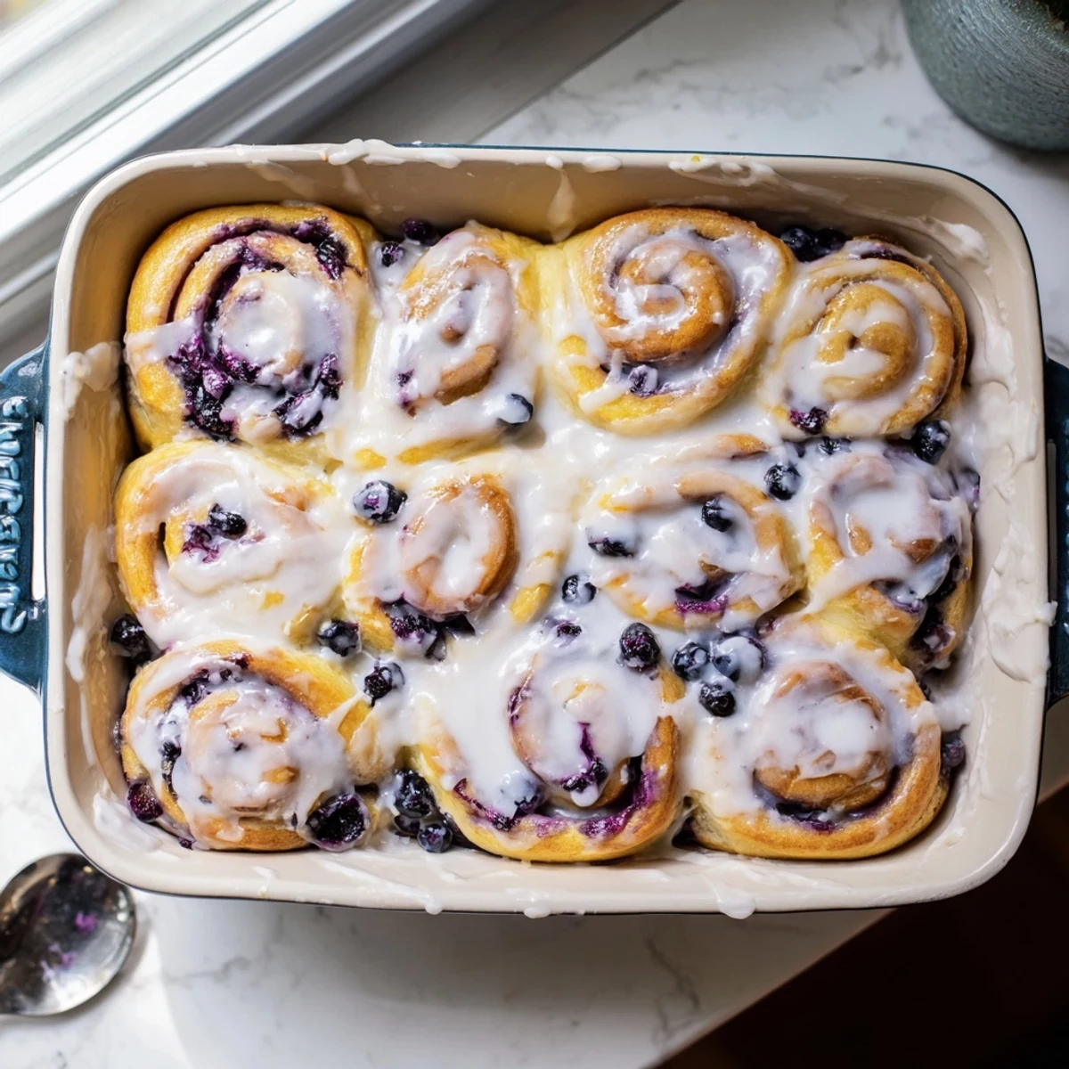 Golden baked pastry swirled with tangy lemon and sweet blueberry filling