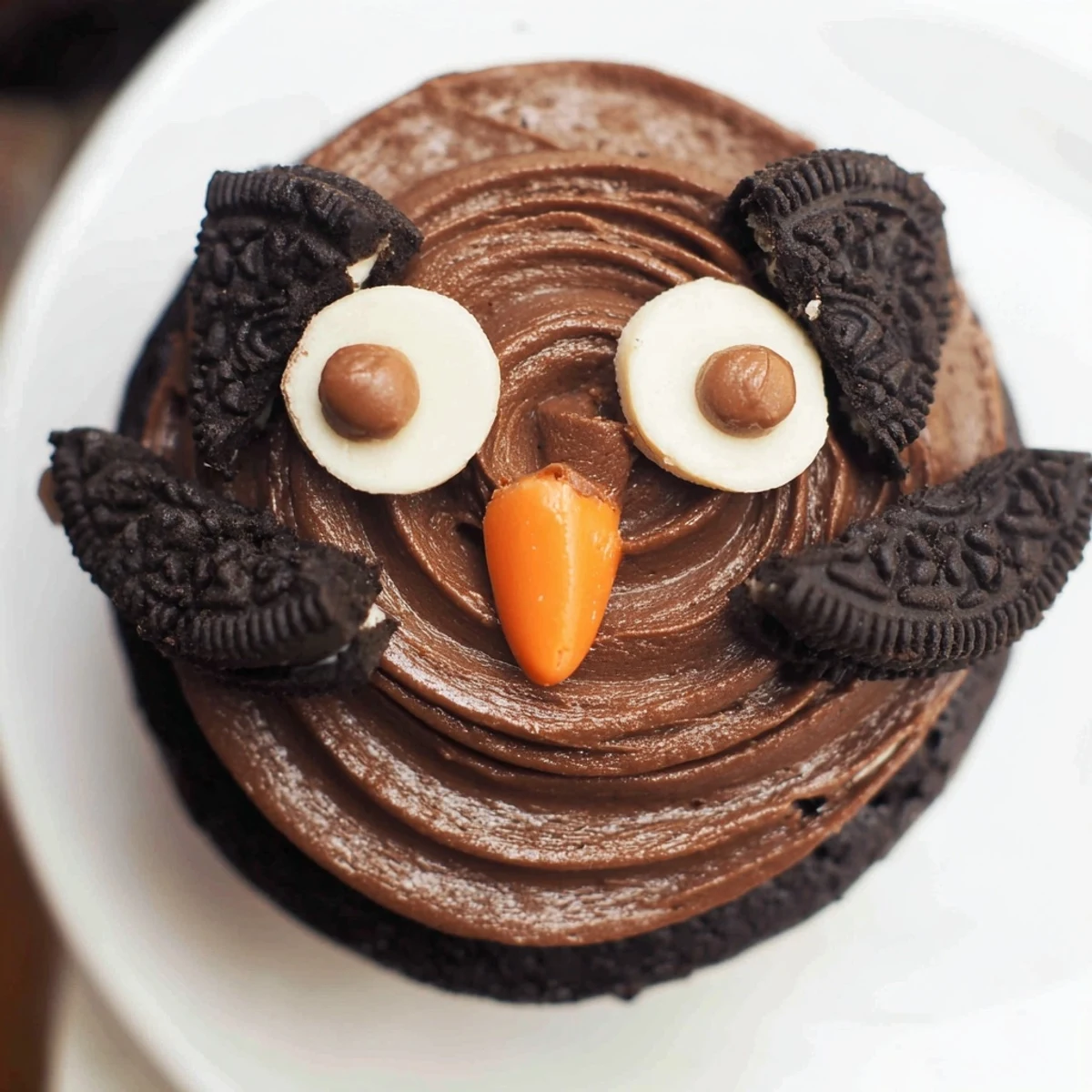 Decadent Oreo Owl Cupcakes topped with creamy frosting and playful Oreo cookie owl faces
