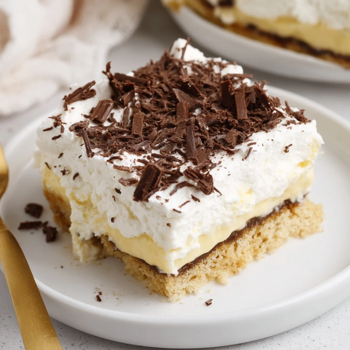 No Bake Layered Dessert with creamy whipped layers, crunchy graham crust, chilled