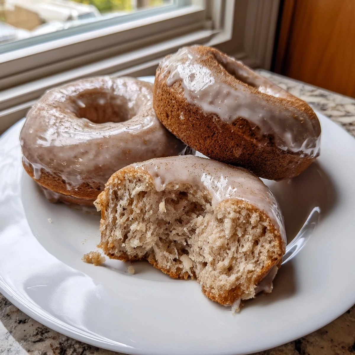 Baked Banana Donuts straight from oven, moist interior and warm cinnamon scent