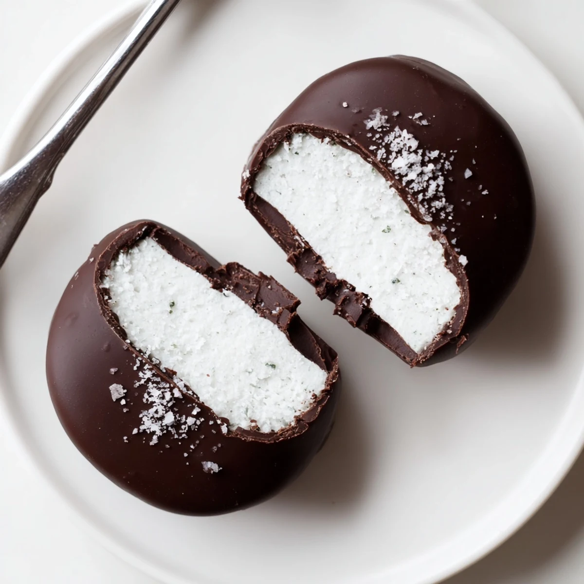 Peppermint Patties chilled on parchment, glossy dark chocolate and minty aroma