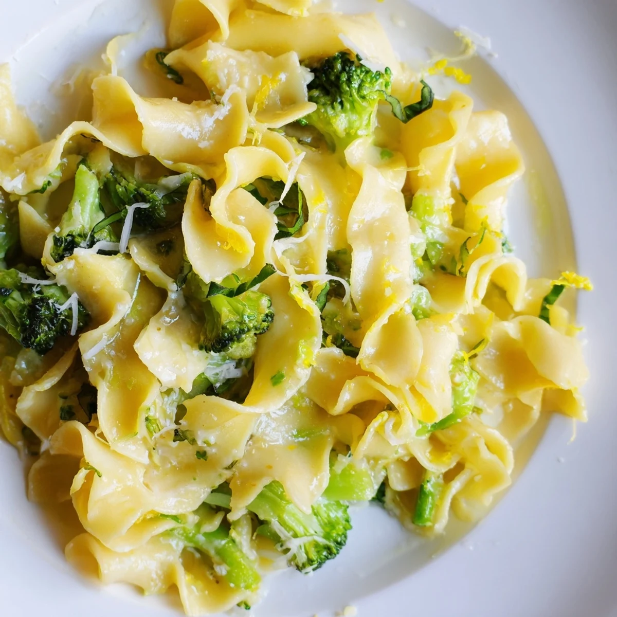 Mafaldine Pasta Limone Broccoli tossed in creamy lemon butter sauce with tender green florets and Parmesan